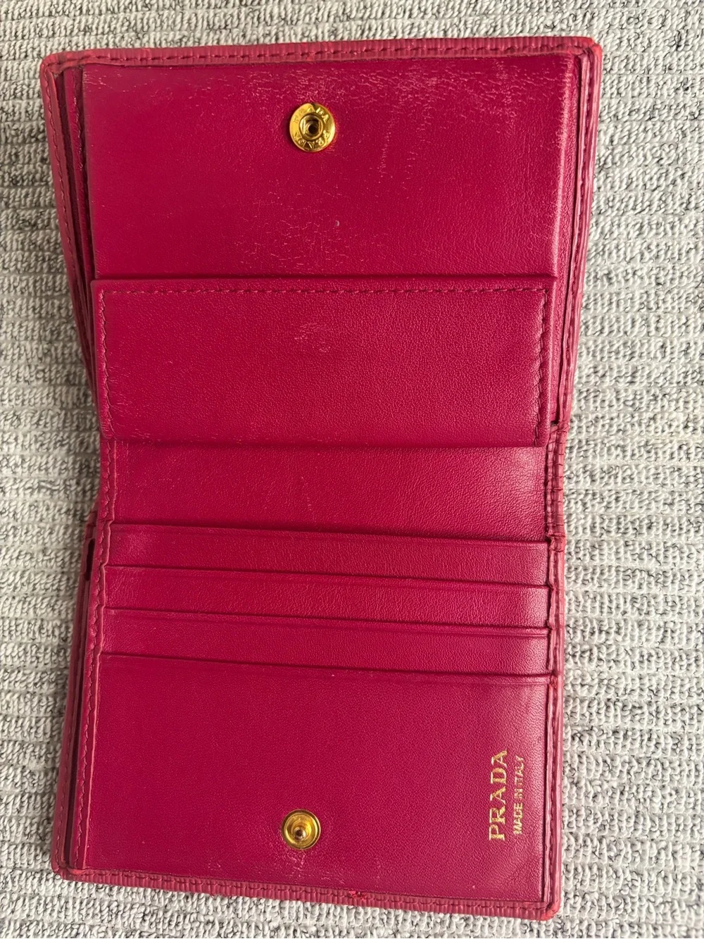 Authentic Prada Saffiano Leather Compact Wallet in deep red/berry/magenta color